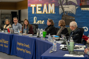 Board member Carl Treutler, Secretary Kristal Boyd, and President Nichol Stack
