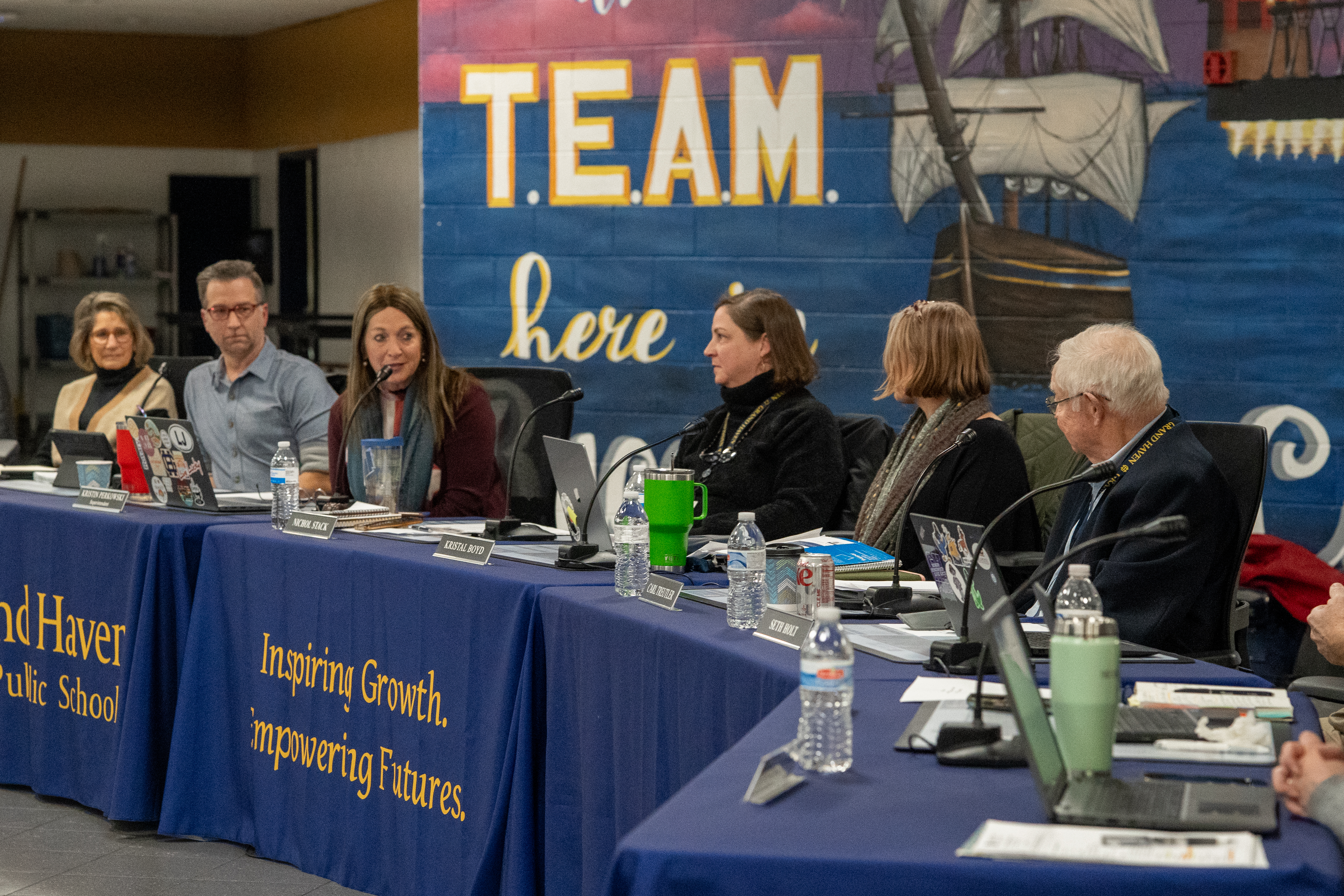 Board member Carl Treutler, Secretary Kristal Boyd, and President Nichol Stack